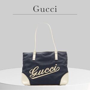 Gucci navy tote bag with leather trim